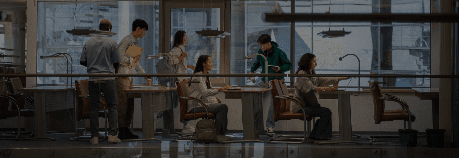 Paylink US team collaborating in a modern workspace